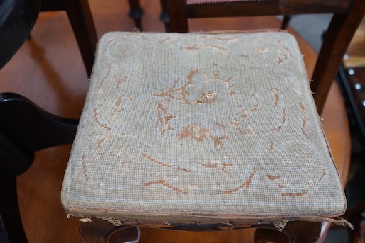 A Victorian rosewood footstool, width 32cm, height 36cm and a contemporary ebonised adjustable piano stool